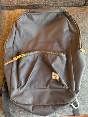 Herschel Supply Company Black Backpack with Gold Zippers and Tan Pulls